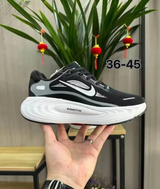 Nik Vomero 19 white black