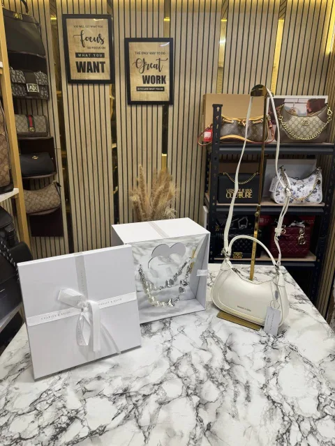 Charls & Keith Gift Set In White Faux Leather Hobo Bag
